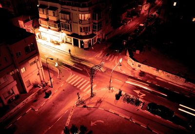 View of illuminated road at night