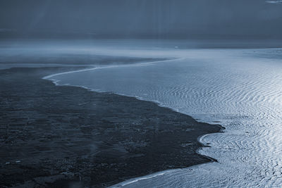 Scenic view of sea during winter