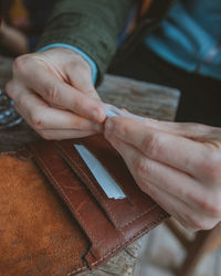 Midsection of woman making joint