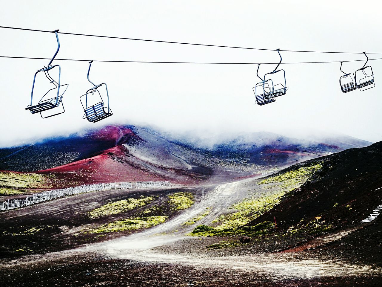 transportation, mountain, road, power line, clear sky, electricity pylon, sky, landscape, cable, connection, the way forward, tree, power supply, nature, country road, tranquility, scenics, day, tranquil scene, land vehicle