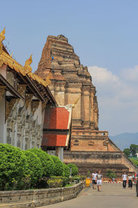 Group of people in temple against building