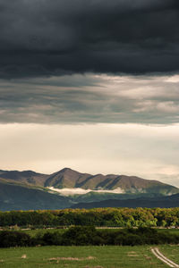 Scenic view of mountains against sky during sunset