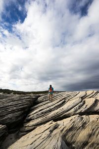 Scenic view of landscape against cloudy sky