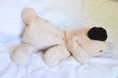 High angle view of stuffed toy on bed at home