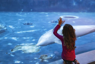 Young woman swimming in sea