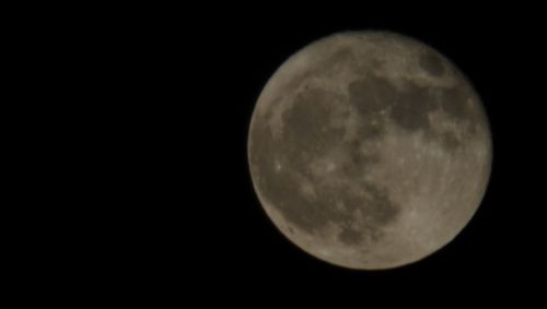 Scenic view of moon against sky at night