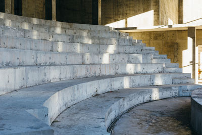 Photo of building under construction, amphitheater, scene, platform, concrete, construction concept