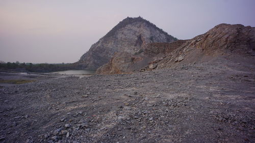 Rock formations in desert against sky