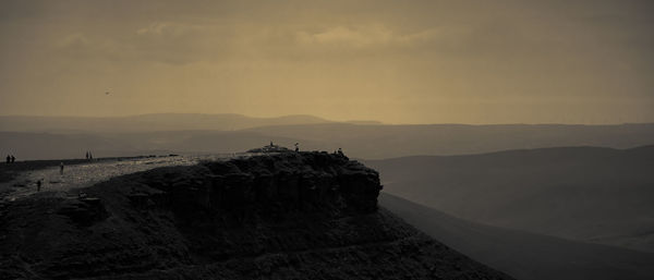 Scenic view of mountains against sky during sunset