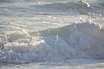 Sea waves splashing on shore