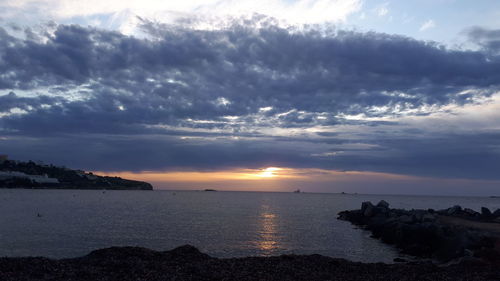 Scenic view of sea against sky during sunset