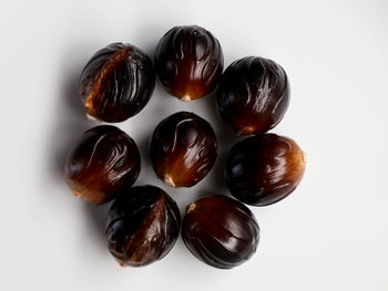 High angle view of fruits against white background