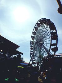 Low angle view of building against cloudy sky