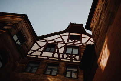 Low angle view of old building against sky