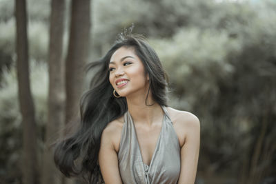 Portrait of a smiling young woman