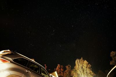 Low angle view of illuminated stars against sky at night