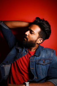 Portrait of young man looking away