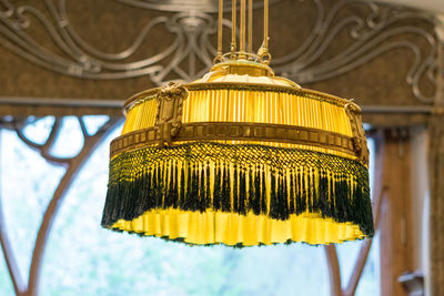 Low angle view of yellow lanterns