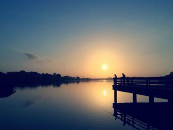 Scenic view of sunset over river