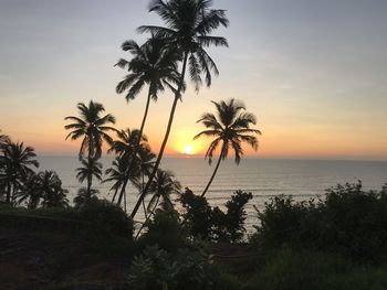 Scenic view of sea against sky at sunset