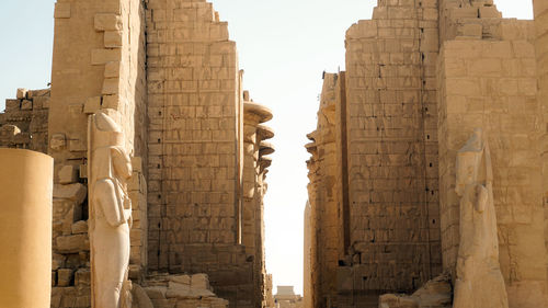 Luxor egypt karnak temple sandstones architecture hierogyphic wall pharoah and ancient story