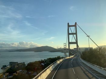 View of bridge over road against sky