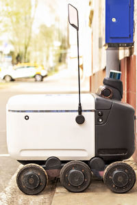 Automatic delivery robot for the transportation of goods and packages.futuristic robot electric car