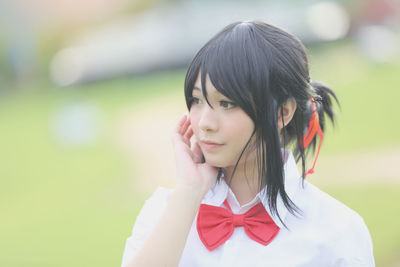 Close-up portrait of young woman