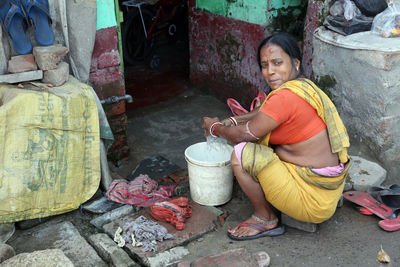 Woman sitting outdoors