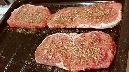 Close-up of meat on barbecue grill