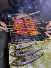 Close-up of meat on barbecue grill