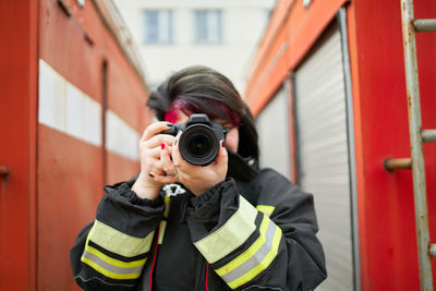 Portrait of man photographing