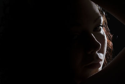 Close-up portrait of young woman