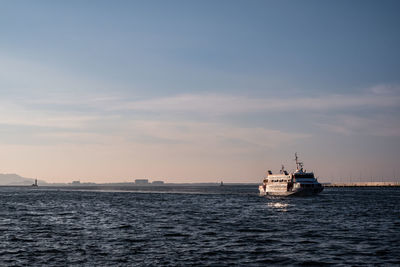 Large ship on sea against sky