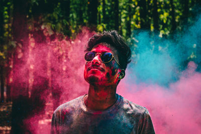 Portrait of young man wearing sunglasses