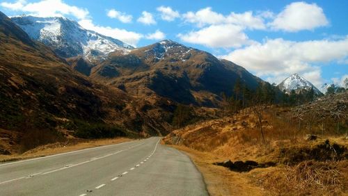 Country road passing through mountains