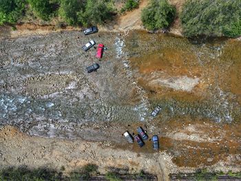 High angle view of people walking on road