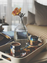 Close-up of coffee cup on table