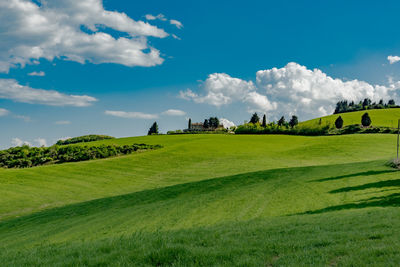 High angle view of agricultural field against cloudy sky