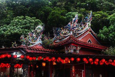 Exterior of temple against trees