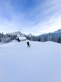 Scenic view of snowcapped mountains against sky