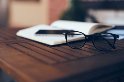 Close-up of eyeglasses on table