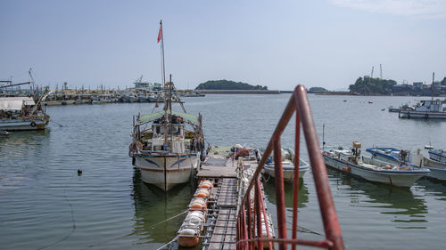 Boats moored in harbor