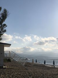 Scenic view of beach against sky