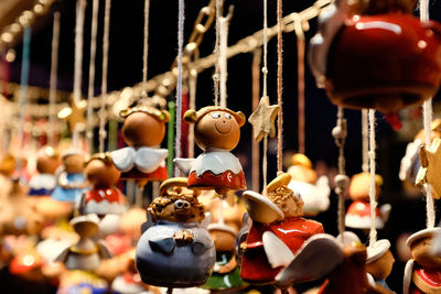 Close-up of toys hanging in store