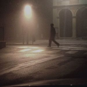 Full length of woman in dark room