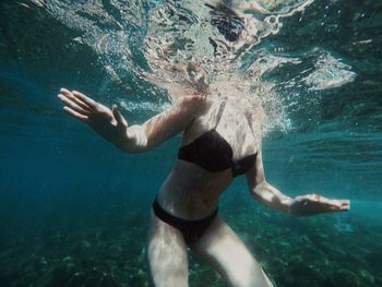 Man swimming in sea