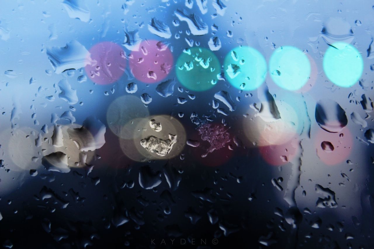 indoors, glass - material, transparent, full frame, water, backgrounds, window, drop, wet, close-up, glass, blue, car, rain, bubble, high angle view, no people, day, season, weather