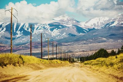 Dirt road against mountains