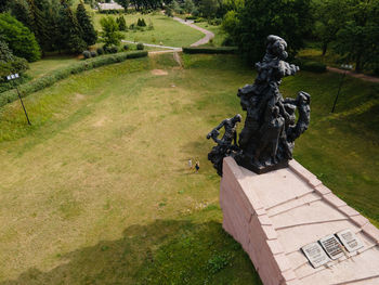 Statue of woman in lawn